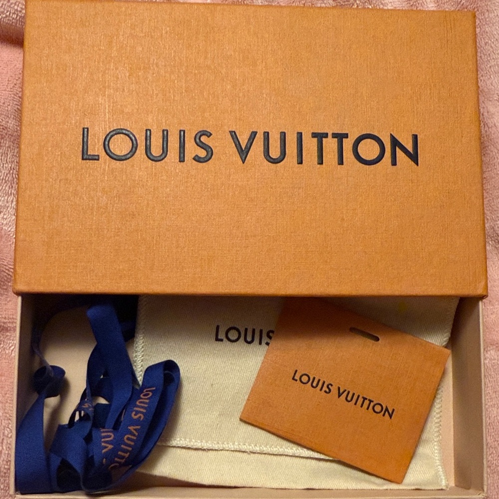 Small Louis Vuitton Orange Box with Blue Ribbon and Cream Bag